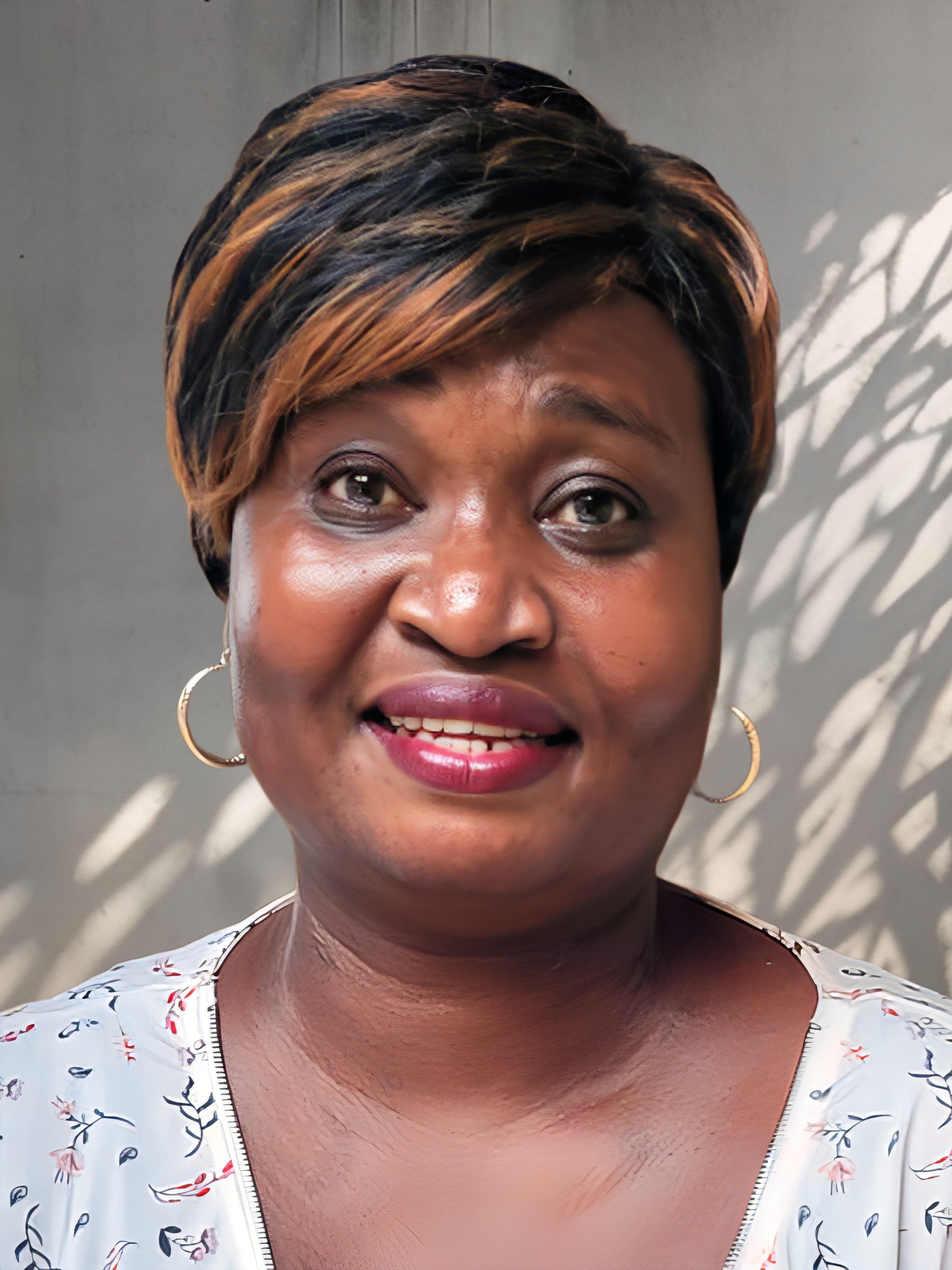 Madame Claudine KIMPIKA LAWU